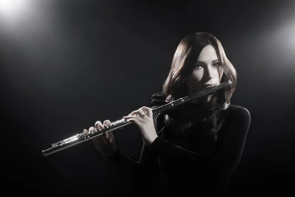 Flute player flutist playing music instrument — Stock Photo, Image