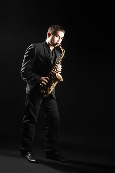 Saxophone player Saxophonist with sax alto — Stock Photo, Image