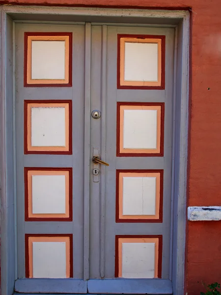 Bright colors traditional painted wooden door — Stock fotografie