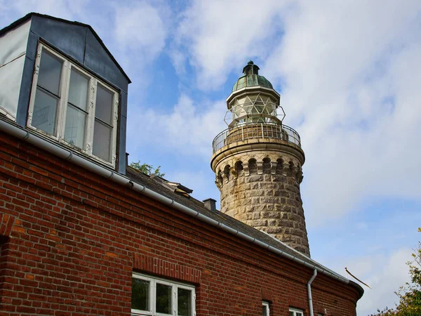 Old stone traditional lighthouse on the beach the island of Aeroe Denmark