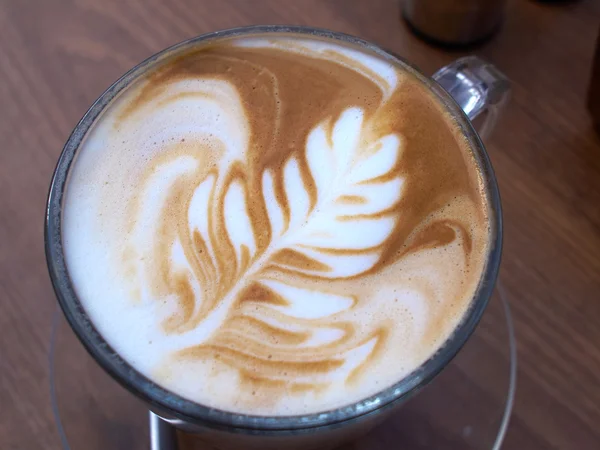 Cup of latte art coffee — Stock Photo, Image