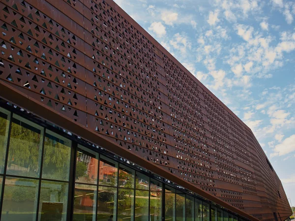 Modern design building with a rusty facade — Stock Photo, Image