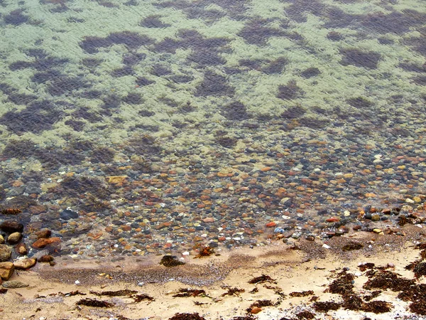 Bovenste weergave van stenen in de zee — Stockfoto