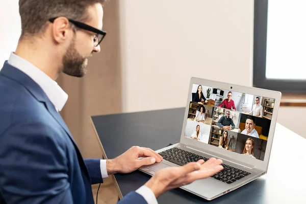 Side view of a business meeting online