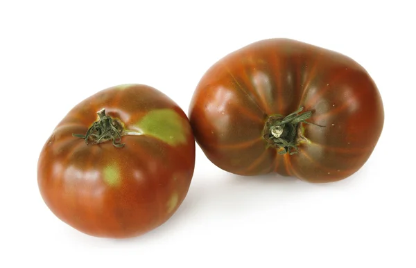 Twee tomaten op witte achtergrond — Stockfoto