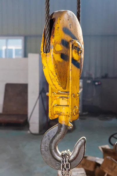 Old yellow iron hook — Stock Photo, Image