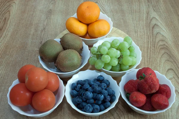 Six bowls of fruit — Stock Photo, Image