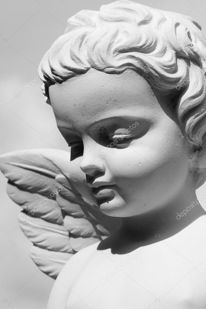 Angelic antique statue