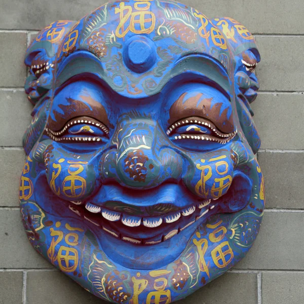 Chinese masker op de muur — Stockfoto