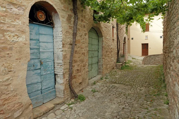 Callejón de piedra pavimentada en Italia —  Fotos de Stock