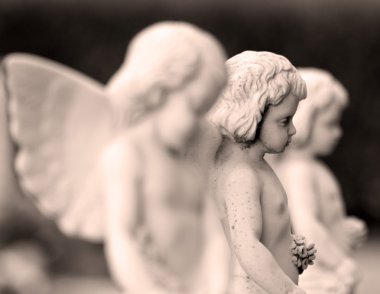Little angelic statues clipart