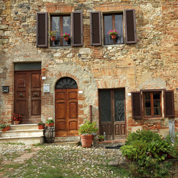 Typical cosy courtyard in tuscan village Castiglione d' Orcia
