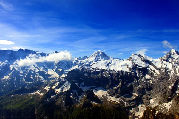 Montanhas no Oberland Bernês Fotos De Bancos De Imagens