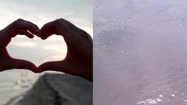 Wieloekranowe kobiece dłonie pokazują sylwetkę serca o zachodzie słońca, fale morskie na plaży — Wideo stockowe
