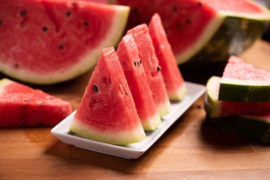 Fresh slices red watermelon on plate close up