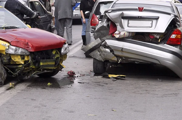 Car crash accident on street with wreck and damaged cars