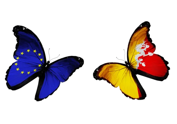 Concept - two butterflies with EU and Bhutan flags flying — Stock Photo, Image