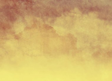 Arkaplan olarak bulutları olan renkli bir gökyüzü. Suluboya