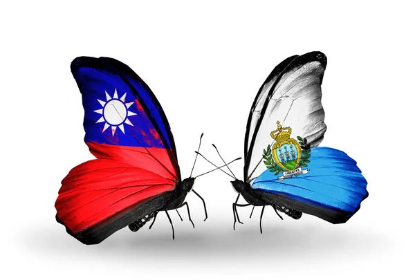 Butterflies with  Taiwan and San Marino flags on wings — Stock Photo, Image