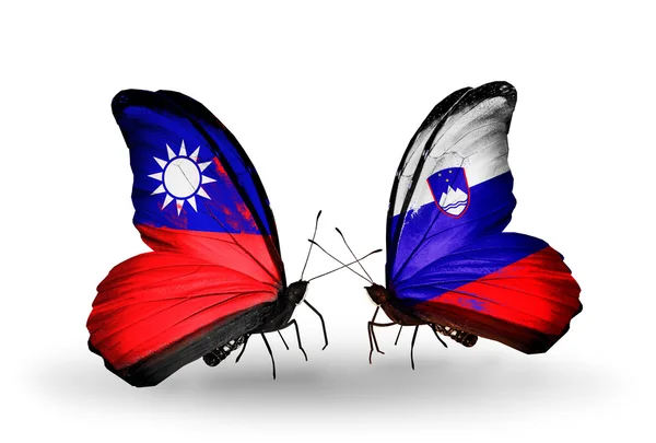 Butterflies with Taiwan and Slovenia flags on wings — Stock Photo, Image