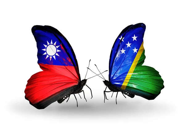 Farfalle con bandiere di Taiwan e Isole Salomone sulle ali — Foto Stock