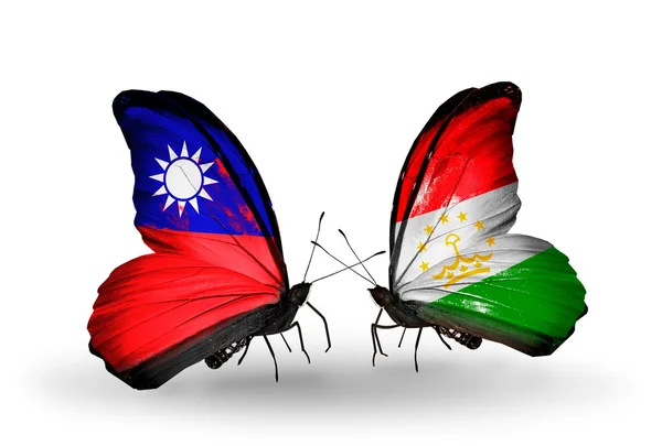 Papillons avec drapeaux Taïwan et Tadjikistan sur les ailes — Photo