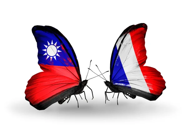 Schmetterlinge mit taiwanesischen und französischen Flaggen auf Flügeln — Stockfoto