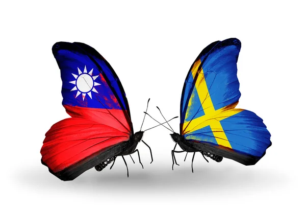 Motyle z Tajwanu i Szwecji flagi na skrzydłach — Zdjęcie stockowe