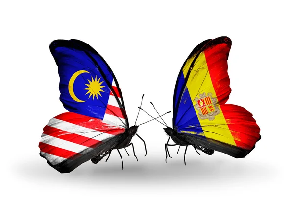 Butterflies with Malaysia and Andorra flags on wings — Stock Photo, Image