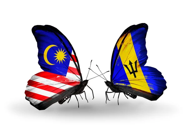 Πεταλούδες με Μαλαισία και Μπαρμπάντος σημαίες με φτερά — Φωτογραφία Αρχείου