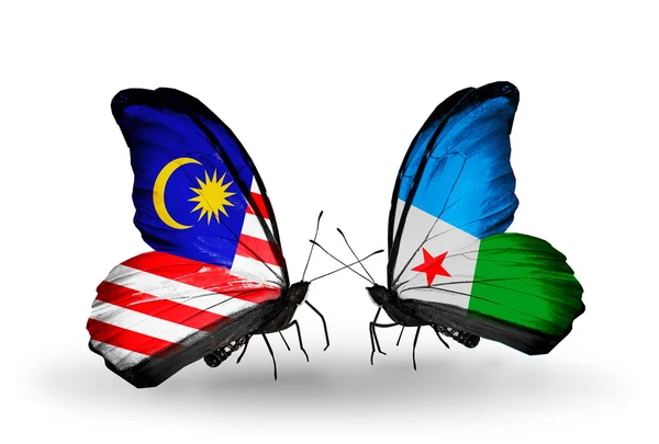Butterflies with Malaysia and Djibouti flags on wings — Stock Photo, Image