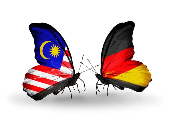 Πεταλούδες με σημαίες Μαλαισία και Γερμανία με φτερά — Φωτογραφία Αρχείου