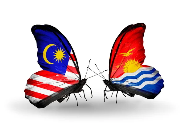 Butterflies with Malaysia and Kiribati flags on wings — Stock Photo, Image