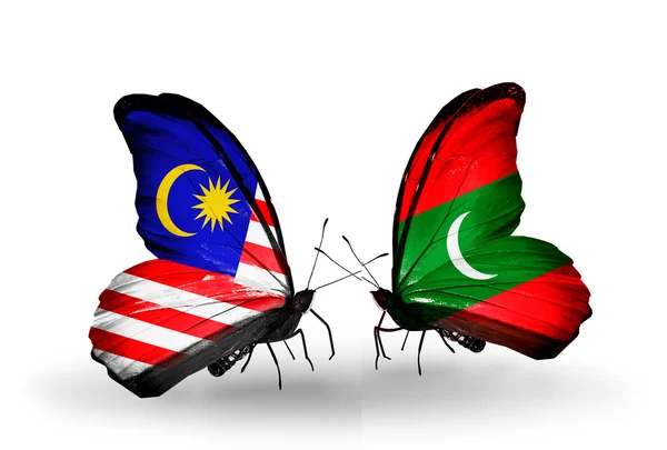 Butterflies with Malaysia and Maldives flags on wings — Stock Photo, Image