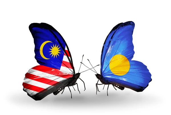 Butterflies with Malaysia and Palau flags on wings — Stock Photo, Image