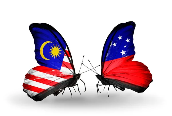 Butterflies with Malaysia and  Samoa flags on wings — Stock Photo, Image