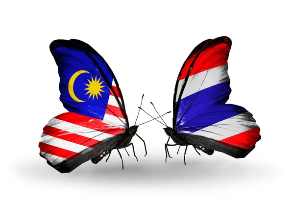 Butterflies with Malaysia and  Thailand flags on wings — Stock Photo, Image