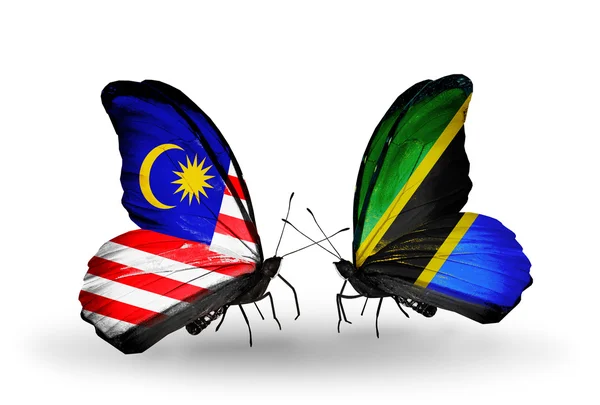 Papillons avec drapeaux Malaisie et Tanzanie sur les ailes — Photo