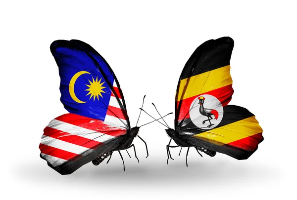Motyle z Malezji i uganda flagi na skrzydłach — Zdjęcie stockowe