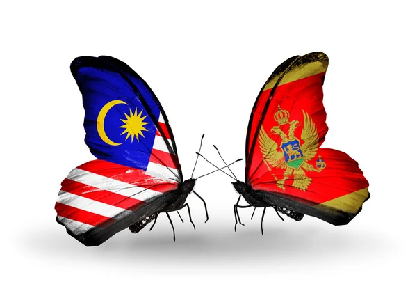 Butterflies with Malaysia and  Montenegro flags on wings — Stock Photo, Image