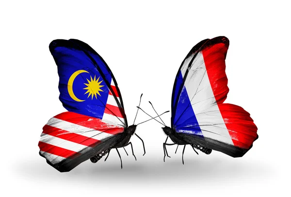 Butterflies with Malaysia and France flags on wings — Stock Photo, Image