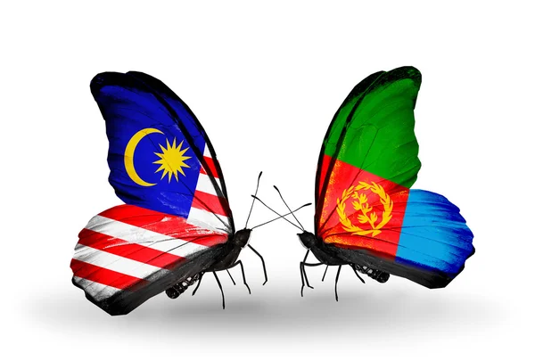 Butterflies with Malaysia and Eritrea flags on wings — Stock Photo, Image