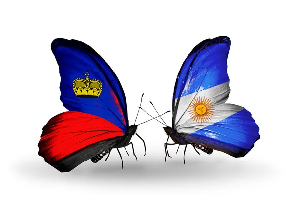 Papillons avec drapeaux Liechtenstein et Argentine sur les ailes — Photo