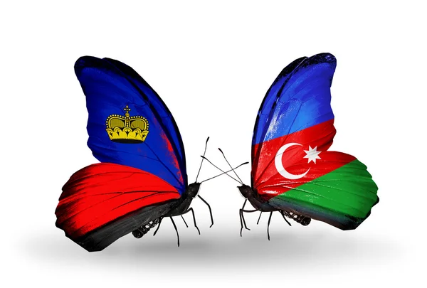 Butterflies with Liechtenstein and Azerbaijan flags on wings — Stock Photo, Image