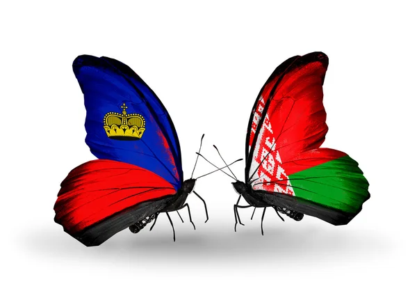 Butterflies with Liechtenstein and Belarus flags on wings — Stock Photo, Image