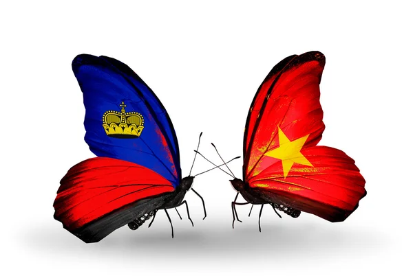 Butterflies with Liechtenstein and Vietnam flags on wings — Stock Photo, Image