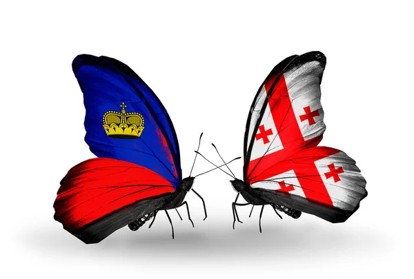 Mariposas con banderas de Liechtenstein y Georgia en alas — Foto de Stock