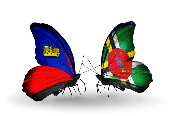 Butterflies with  Liechtenstein and Dominica flags on wings — Stock Photo, Image