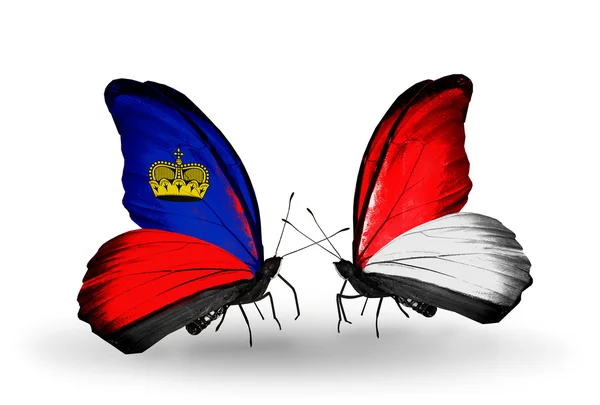 Butterflies with Liechtenstein and Monaco, Indonesia flags on wings — Stock Photo, Image