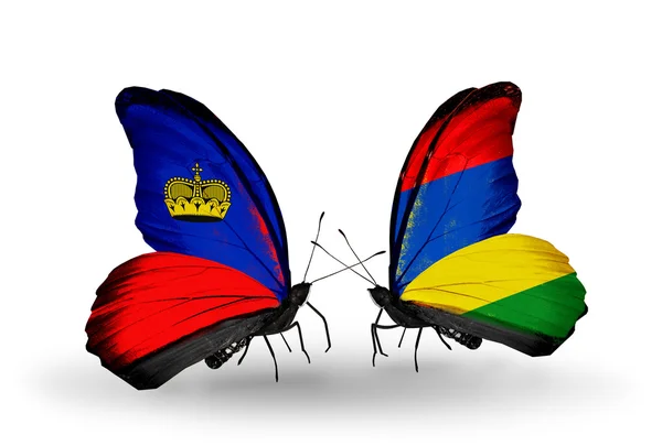Borboletas com bandeiras do Liechtenstein e da Maurícia em asas — Fotografia de Stock